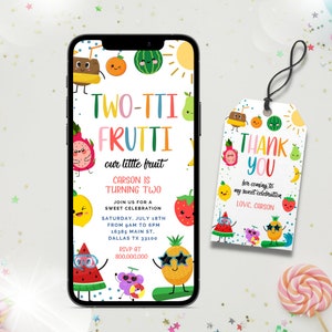 May include: A colorful invitation for a child's birthday party with a fruit theme. The invitation features a phone screen with the text "TWO-TTI FRUTTI our little fruit CARSON IS TURNING TWO" and a thank you tag with the text "THANK YOU for coming to my sweet celebration LOVE: CARSON".