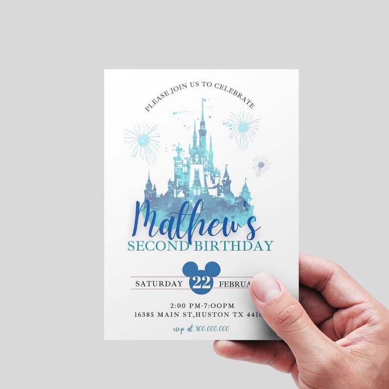 May include: A blue and white watercolor illustration of a castle with fireworks. The text "Matthew's Second Birthday" is below the castle. The date "Saturday 22 February" is below the text. The time "2:00 PM-7:00PM" is below the date. The address "16385 Main St, Huston TX 4411" is below the time. The RSVP information "RSVP at 800.000.000" is below the address.
