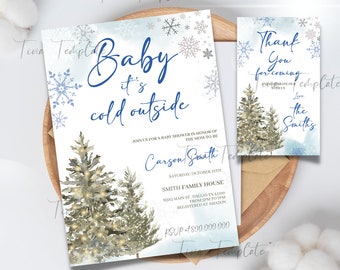 May include: A blue and white baby shower invitation with a winter theme. The invitation features a watercolor illustration of two pine trees with white lights and snowflakes. The text reads "Baby it's cold outside" and includes the name "Carson Smith" and the date "Saturday, October 15th".