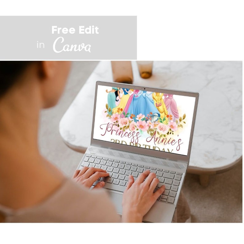 May include: A laptop screen displaying a printable birthday invitation featuring Disney princesses in a floral wreath with the text "Princess Annie's 2nd Birthday".