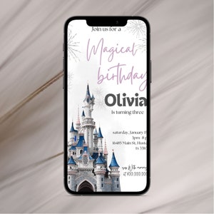 May include: A digital invitation for a birthday party with a picture of Cinderella's castle. The invitation says "Join us for a Magical birthday Olivia is turning three" and includes the date, time, and location of the party.