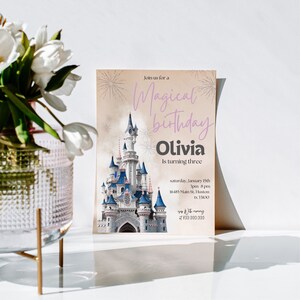 May include: A pink and purple birthday invitation with a cartoon image of a fairytale castle. The text reads "Join us for a Magical Birthday Olivia is turning three" and includes the date, time, and location of the party.