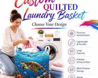 May include: A cylindrical laundry basket featuring a vibrant underwater scene with a sea turtle swimming over a colorful coral reef. The basket has white handles and is filled with folded laundry. Text reads Custom QUILTED Laundry Basket.
