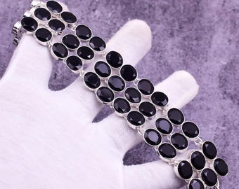 Pulsera de ónix negro facetado hecha a mano en plata de ley 925: joyería bohemia con un toque especial.