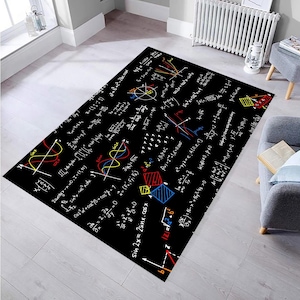 May include: Black and white rug with colorful mathematical equations and symbols. The rug features a variety of mathematical concepts, including algebra, calculus, and trigonometry.