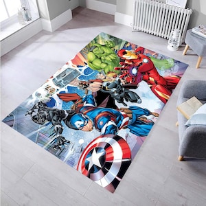 Op de afbeelding: Een kleurrijk tapijt met een groep superhelden, waaronder Captain America, Thor, Hulk, Iron Man en Black Panther. Het tapijt heeft een blauw, rood, groen en zwart kleurenschema en een ontwerp in stripboek stijl.