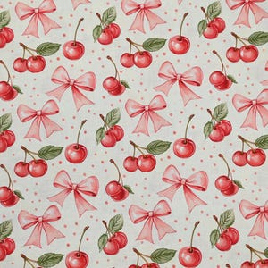 May include: A repeating pattern featuring red cherries, green leaves, and pink bows on a cream backdrop with small red polka dots. The watercolour design creates a whimsical and feminine aesthetic, suitable for fabric or wallpaper.