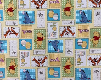 May include: A yellow fabric with a repeating pattern of Winnie the Pooh and his friends. The pattern includes Winnie the Pooh, Tigger, Piglet, Eeyore, and a honey pot. The fabric is perfect for quilting, sewing, and crafting.