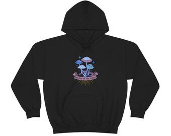 Believe in the Magic Long Sleeve Unisex Heavy Blend Hooded Sweatshirt. Stay Warm and Cozy in this Hoodie for Men or Women.