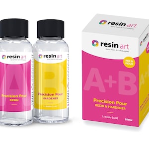 May include: Two clear bottles of resin art epoxy resin and hardener, labeled "Precision Pour Resin" and "Precision Pour Hardener". The bottles are 1:1 ratio and are packaged in a pink box with the text "resin art" and "A+B Precision Pour Resin & Hardener 1:1 Ratio (A+B) 200ml".
