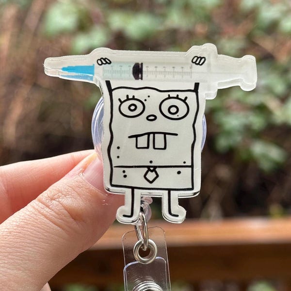 Cartoon Doodle with Syringe Badge Reel