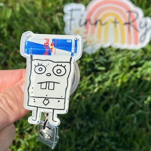Cartoon Doodle holding Energy Drink Badge Reel