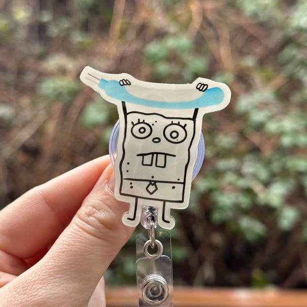 Cartoon Doodle Purewick -Badge Reel