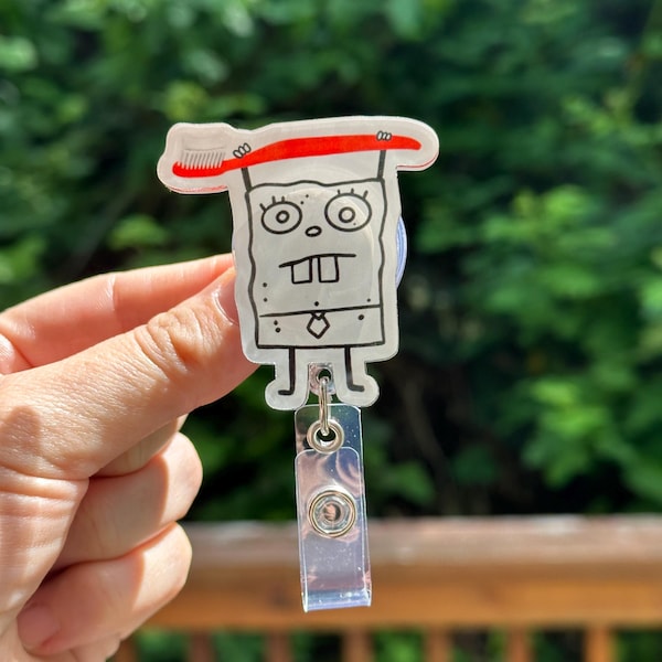Cartoon Doodle with Toothbrush Badge Reel