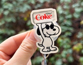 Cartoon Dog holding Diet Soda Badge Reel