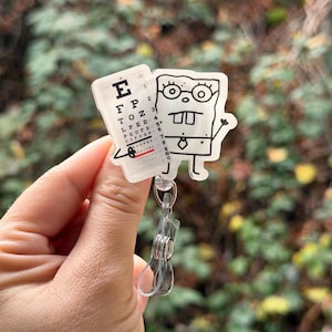 Cartoon Doodle Eye Doc -Badge reel, MD, Ophthalmology, Snellen chart, healthcare work accessory