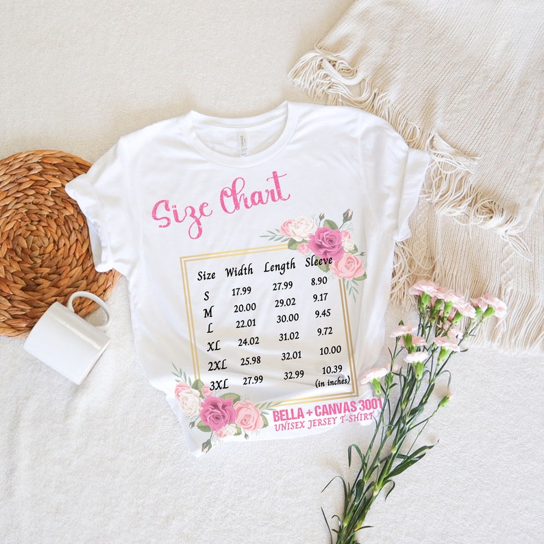 May include: A white unisex jersey t-shirt size chart with floral accents. The chart shows the width, length, and sleeve measurements in inches for sizes S through 3XL.