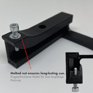 May include: A black 3D-printed L-shaped bracket featuring a silver metal bolt inserted through a top hole. A red line points to the integrated nut, with text stating: Melted nut ensures long-lasting use. A smaller inset shows the bolt from below.