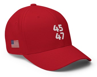 May include: Red baseball cap with a white embroidered American flag on the left side and the numbers "45 47" in white on the front.
