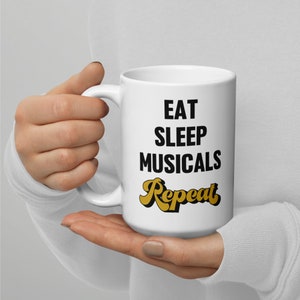 Regalos de teatro, Eat Sleep Musicals repetir taza de teatro, taza de café de Broadway