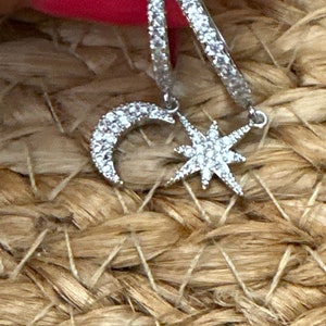 Silver moon and star Huggie Earrings