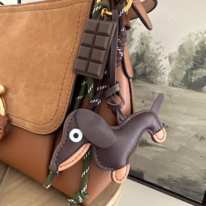 Daschund bag charm.  Daschund key chain/chocolate bar. Coffee colored Daschund. Green and Brown Rope