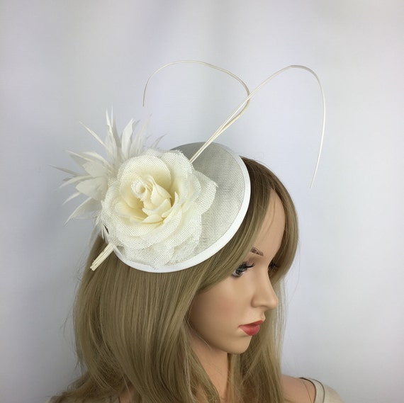 Ivory Cream and  off white Fascinator  on a clipmfor special occasions 