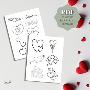 May include: Two white sheets with black line drawings of hearts, cherubs, and the word "love". One sheet has the text "Kiss Me" and "Love". A green hexagon with the text "PDF Printable Stick & Stitch Template" is in the background. Red paper hearts are scattered around.