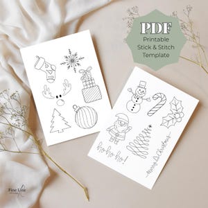 May include: Two white cards with Christmas-themed line art. One card features a stocking, snowflake, reindeer, gifts, Christmas tree, and ornament. The other card has a snowman, candy cane, holly, Santa, and the text "ho ho ho!" and "Merry Christmas".