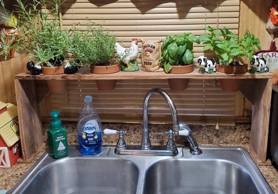 Repupose Over The Sink Shelf ~ Hang upside down over the kitchen window to  use as a plant shelf