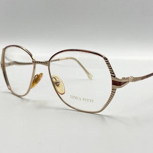 Linea Pitti Florence Design vintage gold cat eye eyeglasses , 80s, mod.337, women glasses frame, made in Italy, NOS