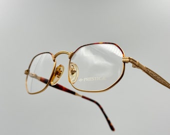Prestige 80s vintage hexagonal eyeglasses, unique and rare gold metal glasses frame, made in Italy new old stock