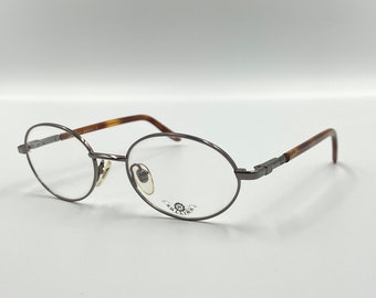 Rolling mod.812 vintage 90s gafas graduadas ovaladas montura plateada hombre mujer NOS made in Italy