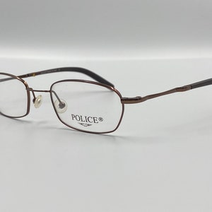 Occhiali da vista rettangolari vintage Police mod.2631, montatura occhiali metallo bronzo made in Italy NOS