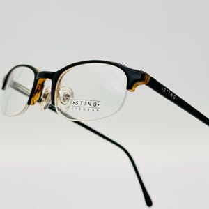 Sting VS6194 vintage eyeglasses, black small half rim oval glasses frame, made in Italy, NOS