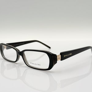 May include: Black rectangular eyeglasses with a gold logo that says "Pollini" on the side of the frame.
