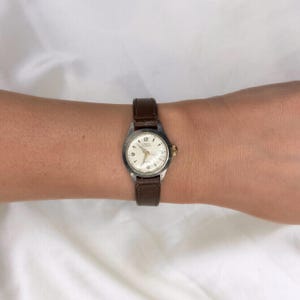 Vintage Carol Swiss Mechanical Watch: 1950s Bookish Style