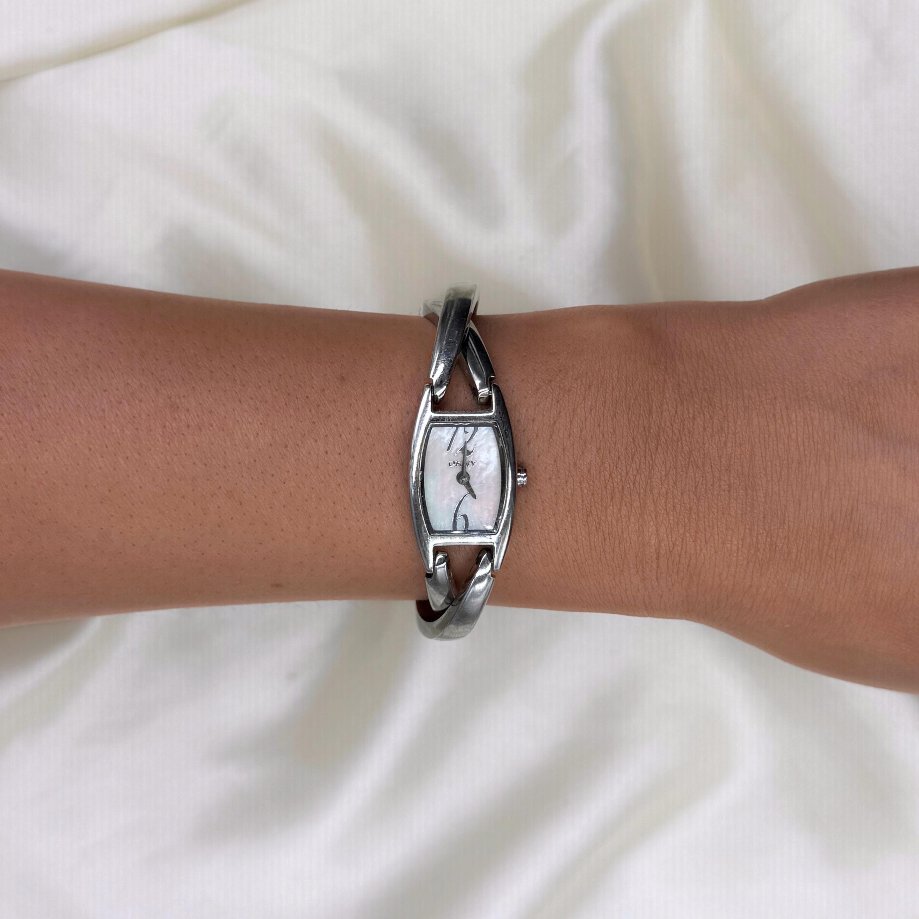 Vintage DKNY Mother of Pearl Watch: Slim Stainless Steel 