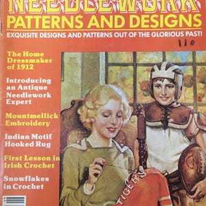 May include: A vintage magazine cover featuring a woman crocheting a red and white football jersey with the word "TIGERS" on it. The magazine is titled "Olde Time Needlework Patterns and Designs" and the cover text says "Exquisite Designs and Patterns Out of the Glorious Past!"