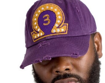 Omega Psi Phi Distressed Numbered Hat