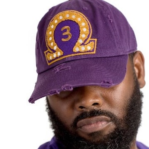 Omega Psi Phi Distressed Numbered Hat