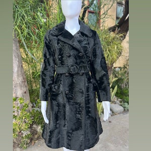 1940’s Broadtale Persian lamb coat with rhinestone buttons and belt .  The most elegant coat in excellent condition. Gorgeous details size S