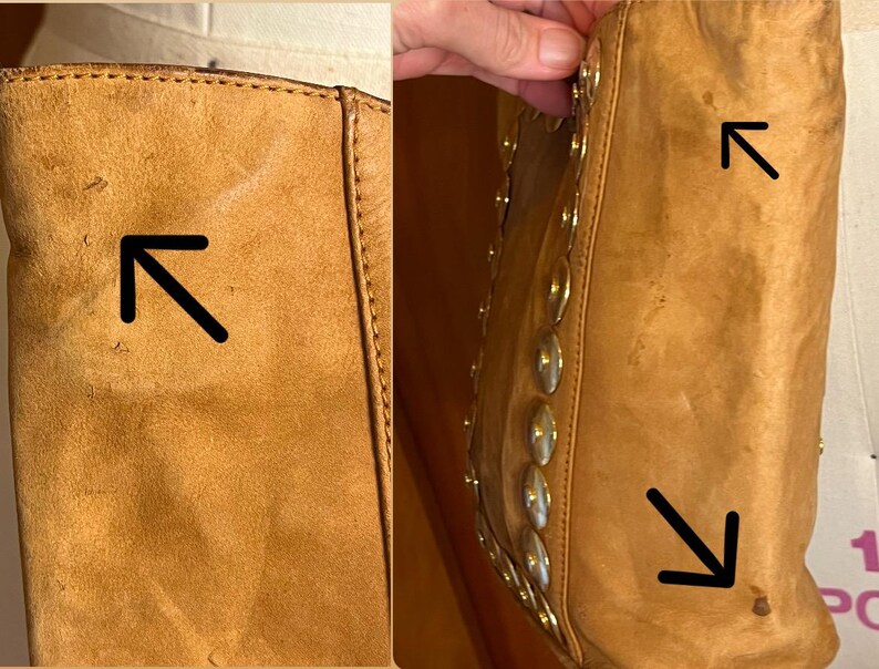 May include: Close-up of a brown leather boot with a seam down the back. The boot has a pointed toe and a small heel. The leather is worn and has a few scratches.