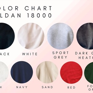 May include: Color chart for Gildan 18000 t-shirts showing 10 different colors: black, white, sport grey, dark grey heather, ash, navy, sand, red, forest green.