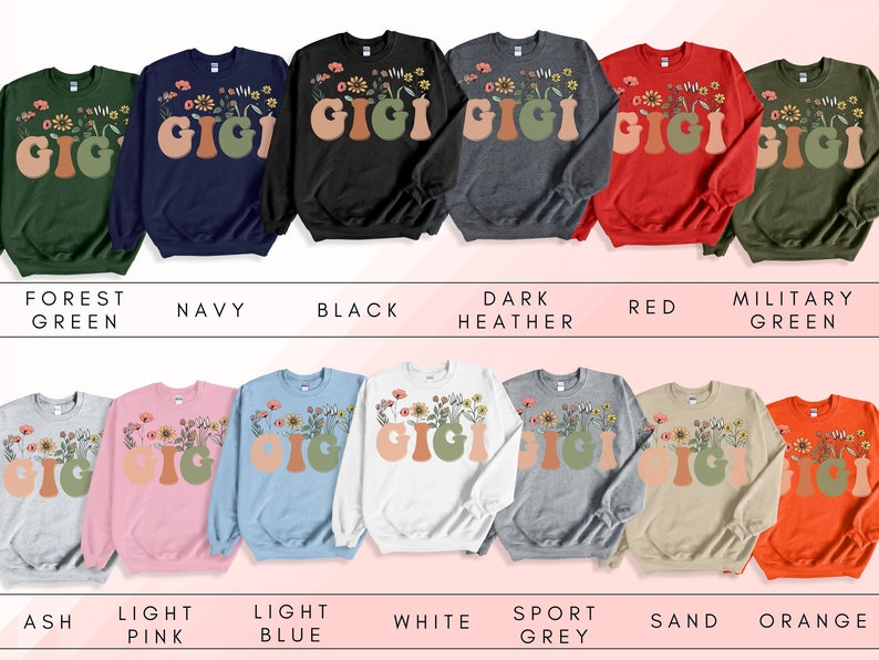 May include: A set of ten sweatshirts in various colors featuring the word "Gigi" with floral accents. The sweatshirts are available in colors such as forest green, navy, black, dark heather, red, military green, ash, light pink, light blue, white, sport grey, sand, and orange.