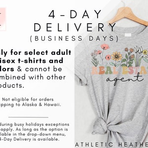 May include: A grey t-shirt with a floral design and the text "REAL ESTATE agent" printed on it. The shirt is on a hanger and has a knotted bottom. The text "ATHLETIC HEATHER" is printed below the shirt. The text "4-DAY DELIVERY (BUSINESS DAYS)" is printed above the shirt. The text "Only for select adult unisex t-shirts and colours & cannot be combined with other products." is printed below the shirt.