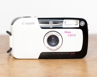 ビンテージ 35 mm Canon Prima Zoom 70F ポイント アンド