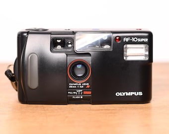 Olympus AF 10 super - Infinity Junior - aparat typu „point and shoot” - analogowy - jak nowy - vintage