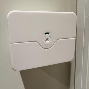 Single PlugMinder for Adaptors: 3D-Printed socket, plug and phone charger cable protector