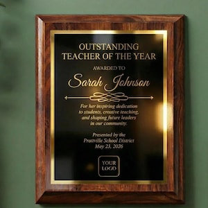 Personalized wooden award plaque with black engraved plate and gold border — Outstanding Teacher of the Year example with customizable recipient name, message, date, and logo.